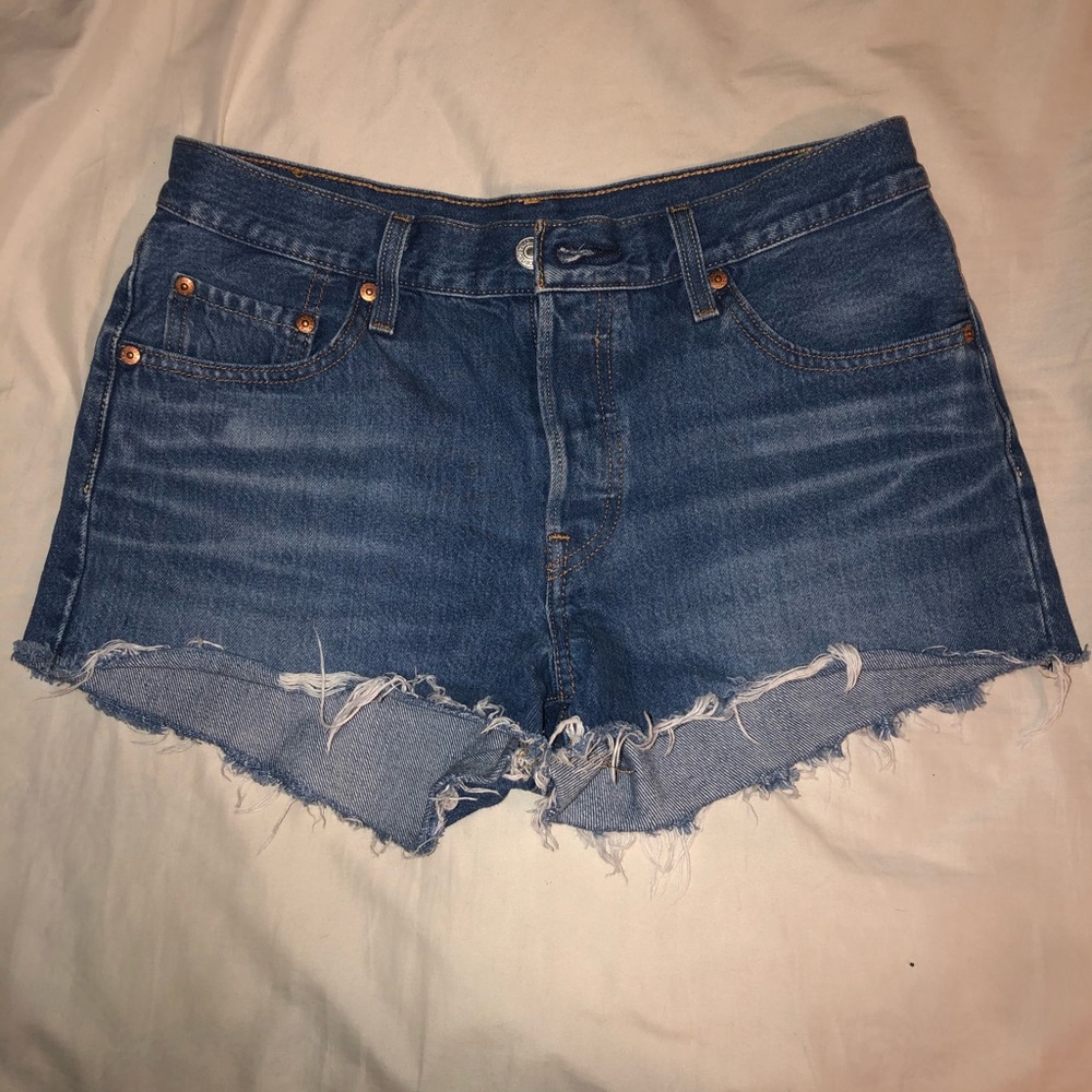 Medium wash 501 Levi’s shorts.